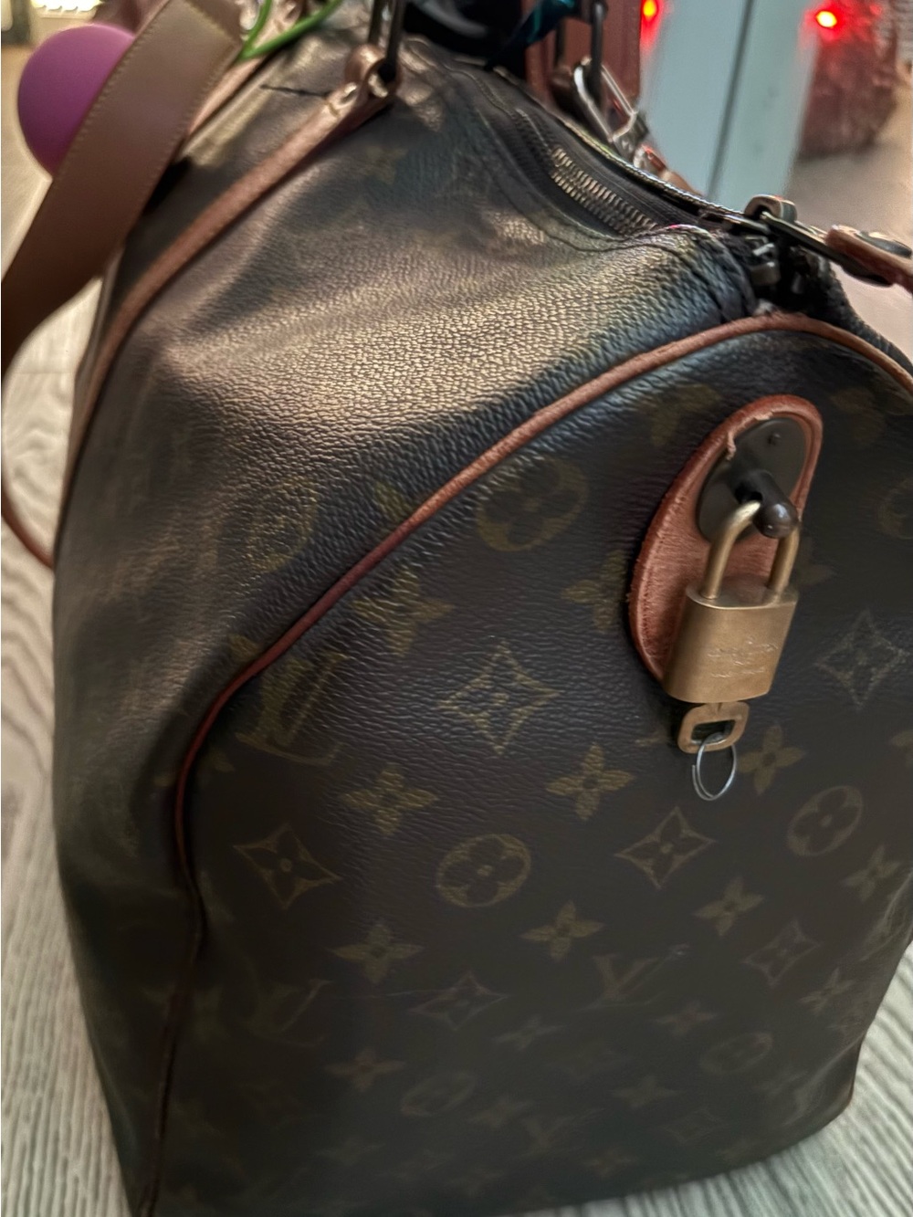 Louis Vuitton Brown Monogram Duffel Bag with Brass Lock